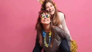 happy ladies with full of photo booth props